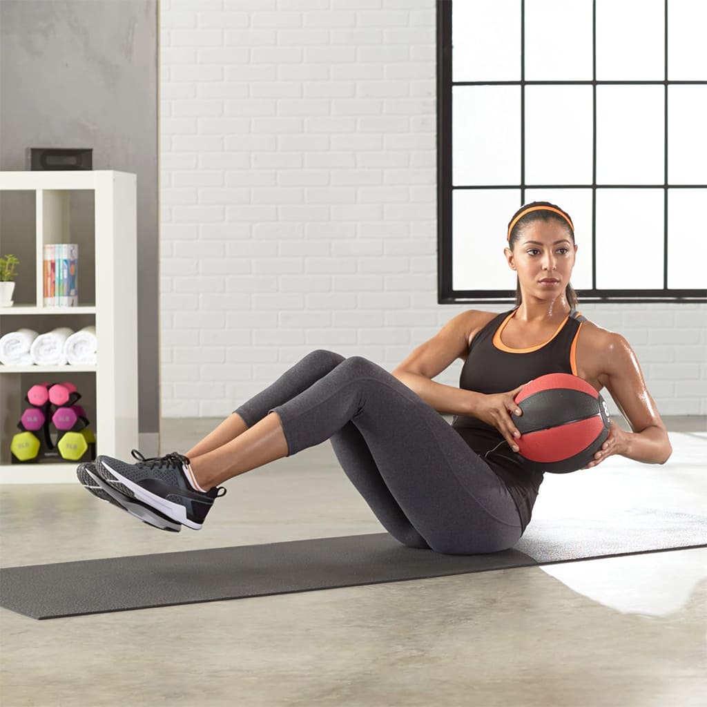 AlephNeta CoreFlex, compact fitness ball, used for core strength and coordination at home.