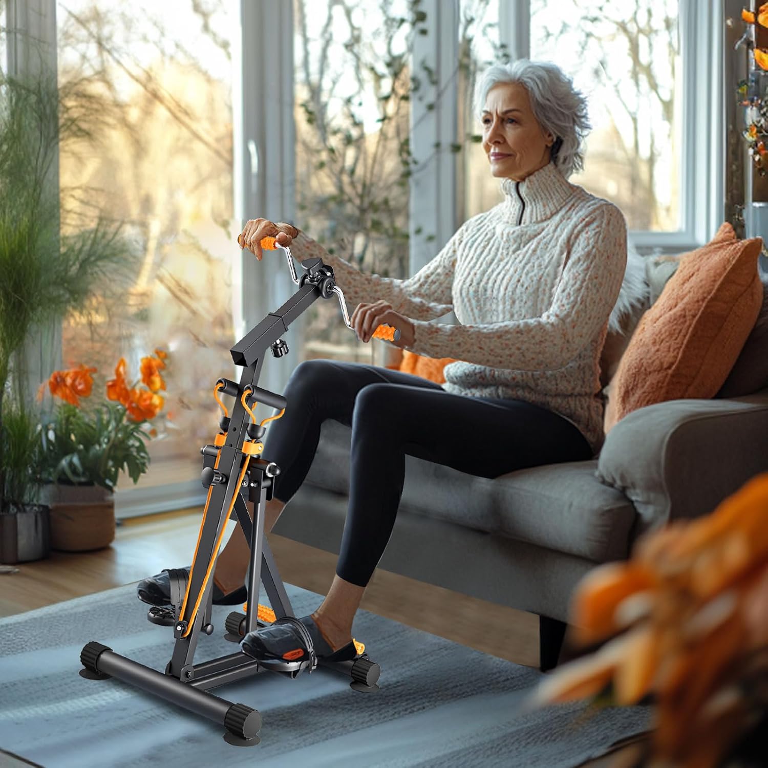 Senior woman using the Alephneta FlexCycle™ at home for improved mobility and strength.